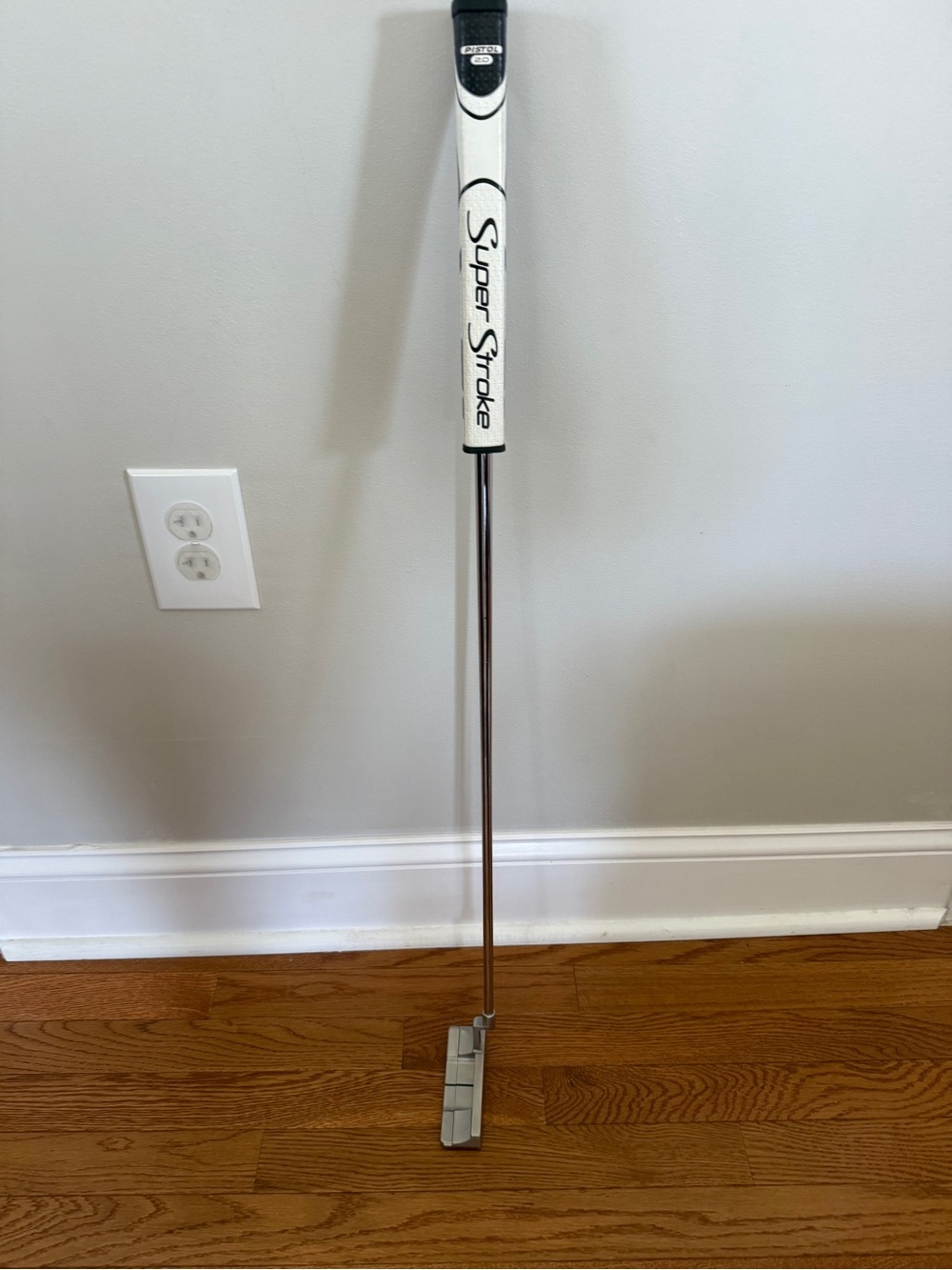 SuperStroke White Golf Putter Grip on Silver Putter